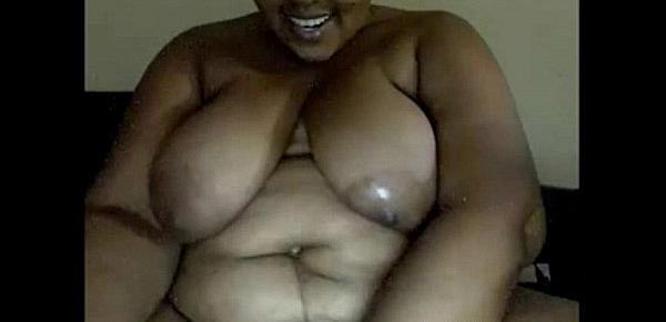  Ebony BBW sucks dildo on webcam